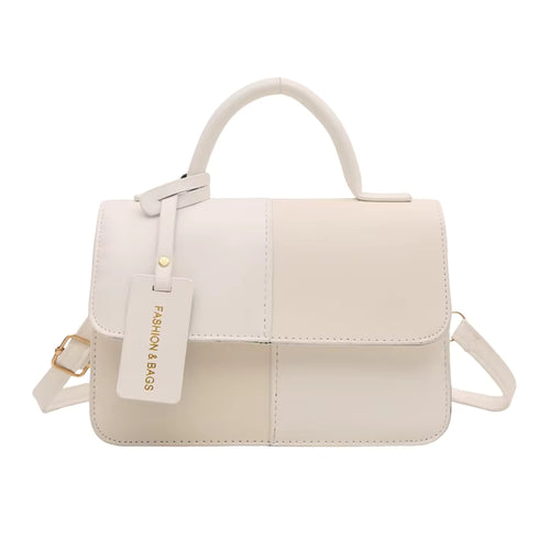 Sac à main élégant bicolore