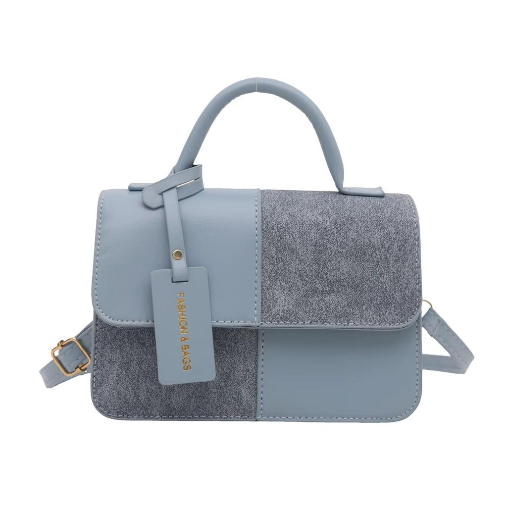 Sac à main élégant bicolore