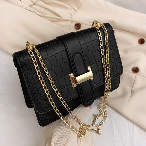 Sac bandoulière effet croco avec chaîne dorée – Chic et intemporel